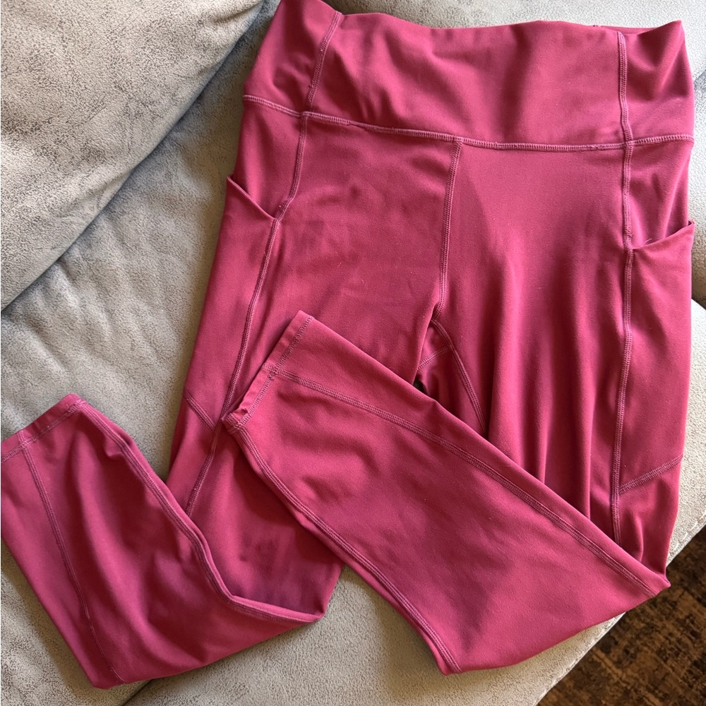 Fabletics High Waisted Pocketed 7/8 Leggings - Merlot Color